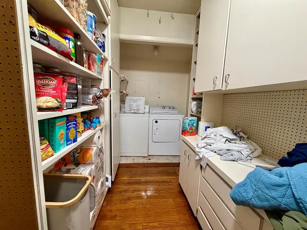 a storage room with washer and dryer