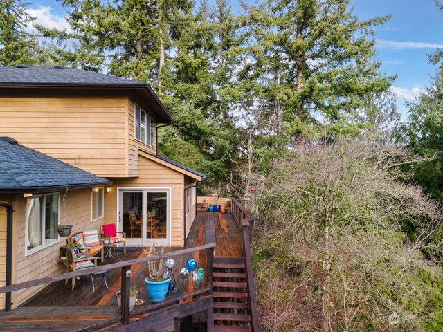 a backyard of a house with seating space