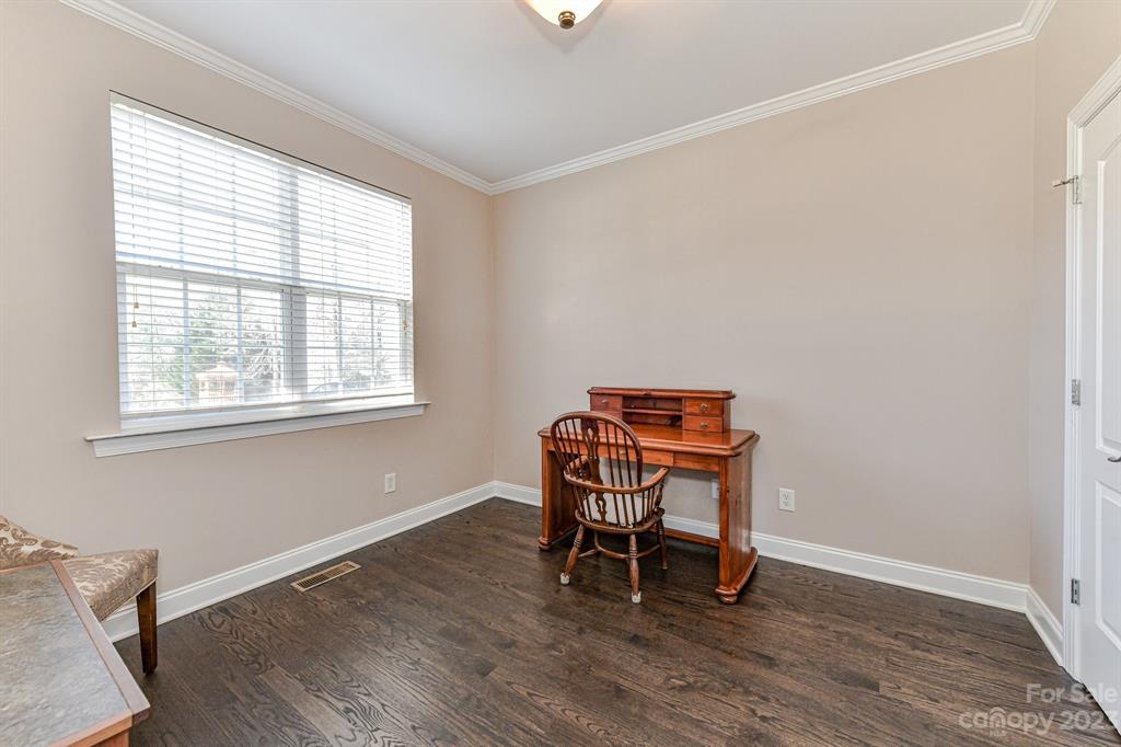 21311 Summerbrook Drive Cornelius, NC 28031 - Photo 11 of 28 a room with wooden floor and a window