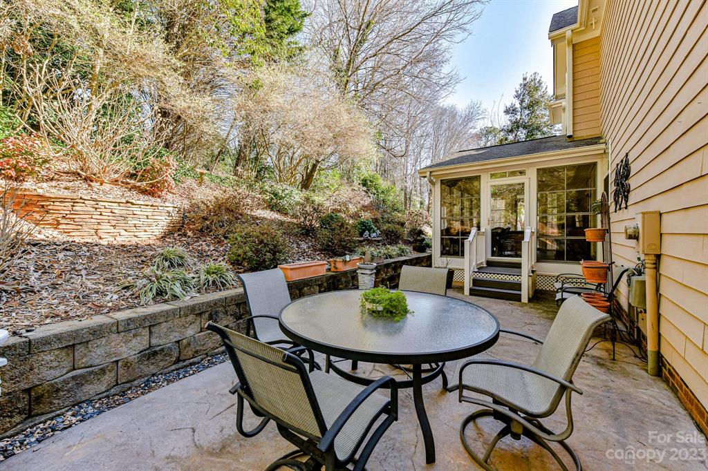 21311 Summerbrook Drive Cornelius, NC 28031 - Photo 26 of 28 a view of a chairs and table in the patio