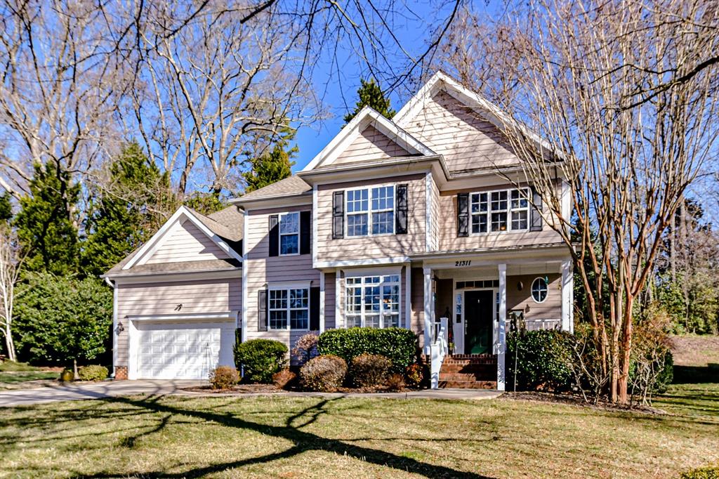 21311 Summerbrook Drive Cornelius, NC 28031 - Photo 28 of 28 front view of a house with a yard