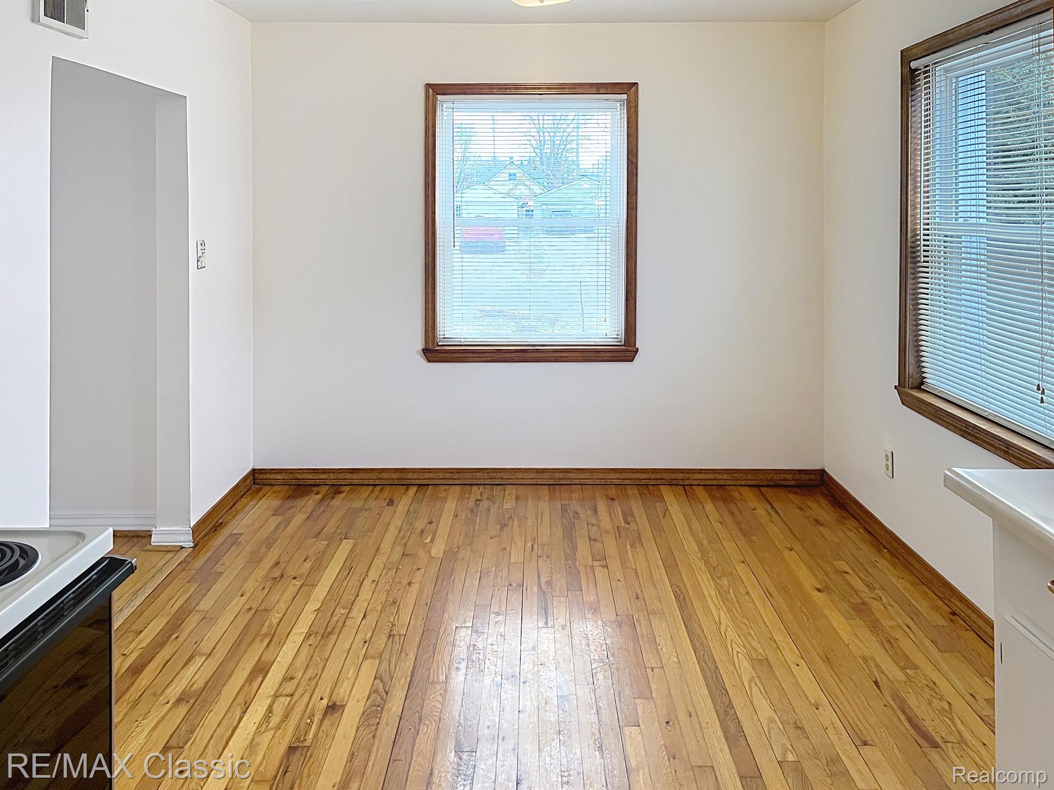 20129 Rensellor Street Livonia, MI 48152 - Photo 8 of 26 Dining area with nice hardwood floors