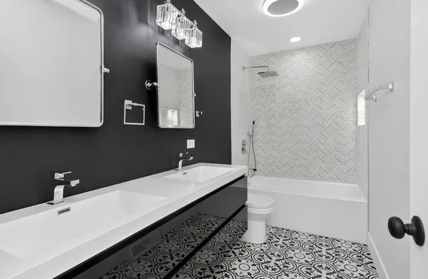 a bathroom with a sink a toilet and a bathtub