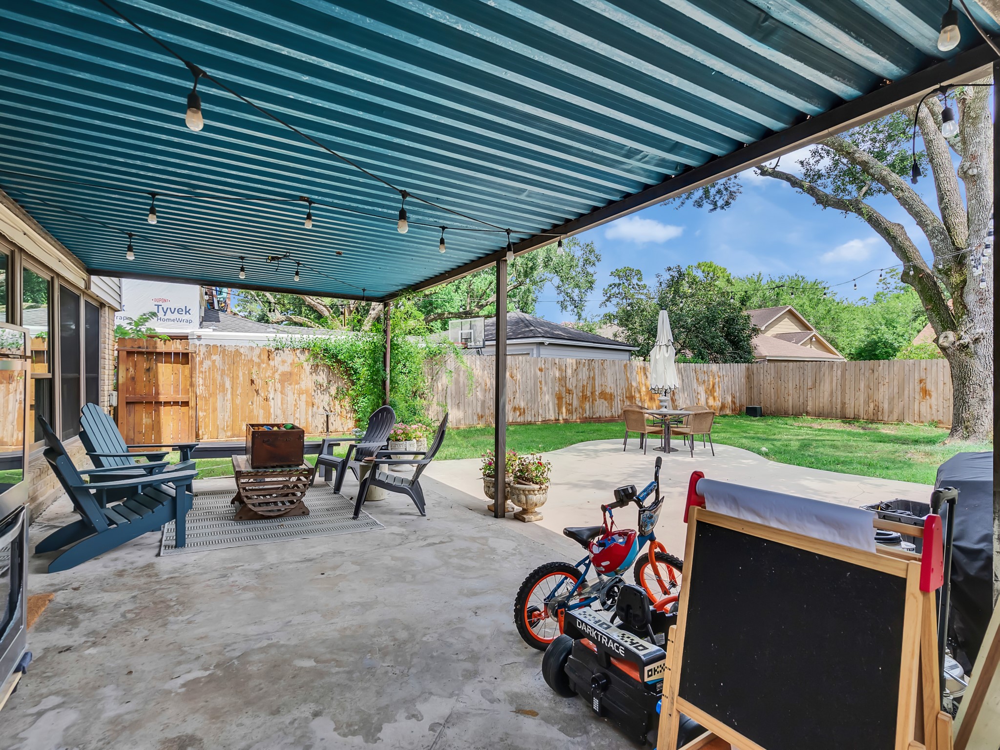3819 Shipman Lane Spring, TX 77388 - Photo 25 of 36 Spacious covered back patio perfect for outdoor entertaining and relaxation.