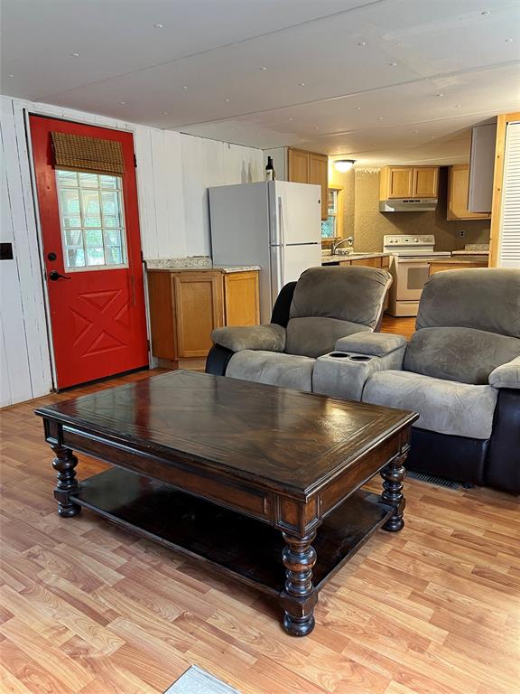 2334 San Bar Road, Unit 46 Graford, TX 76449 - Photo 18 of 37 a living room with furniture pool and a table