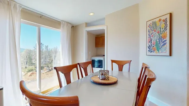 a view of livingroom with furniture and a window