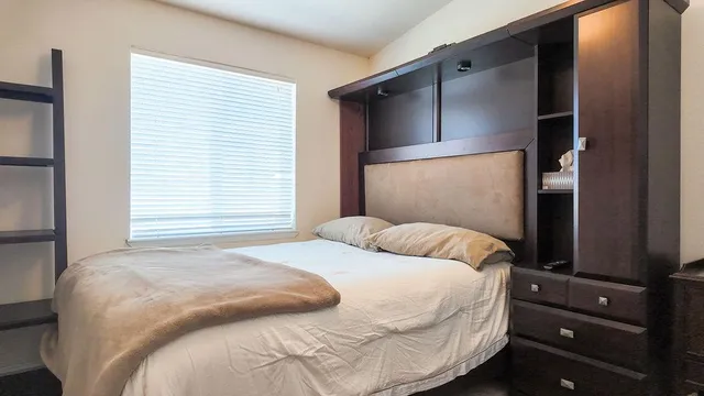 a bathroom with a sink vanity and a mirror