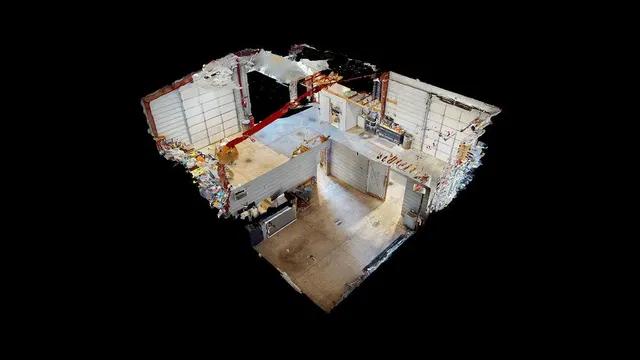 a view of an empty room with a garage