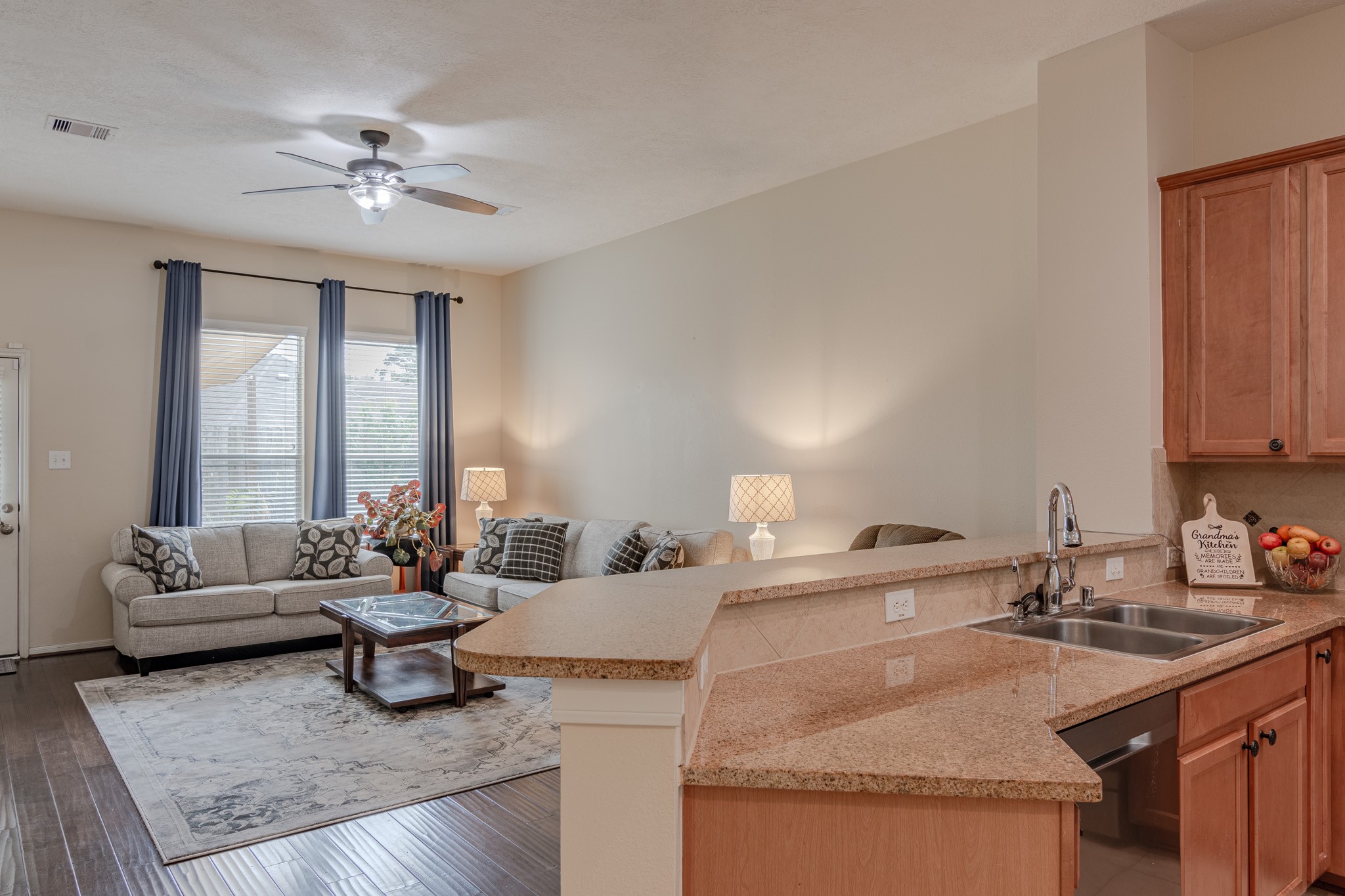 2954 Smokey Forest Lane Spring, TX 77386 - Photo 19 of 40 a living room with furniture and a chandelier