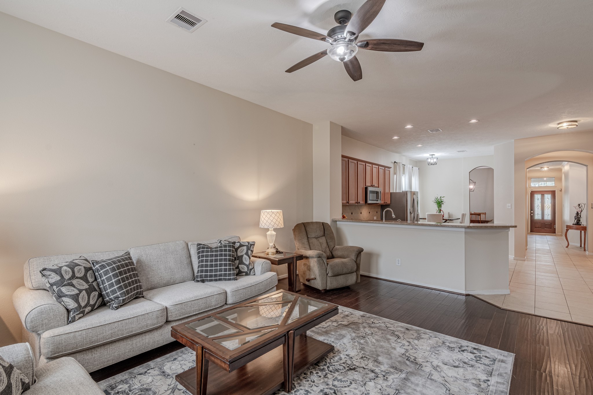 2954 Smokey Forest Lane Spring, TX 77386 - Photo 22 of 40 a living room with furniture and kitchen view