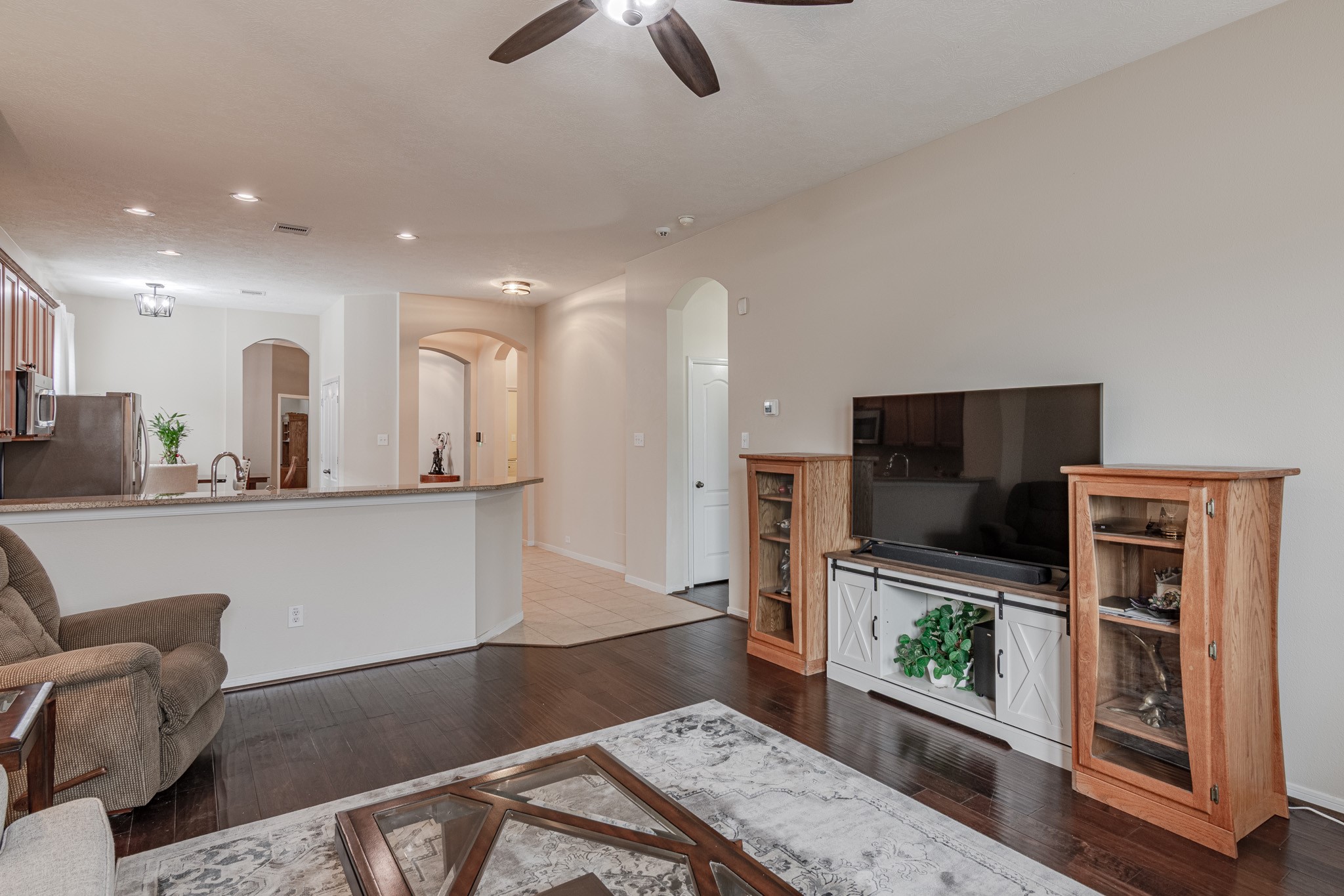 2954 Smokey Forest Lane Spring, TX 77386 - Photo 23 of 40 a living room with furniture and a flat screen tv