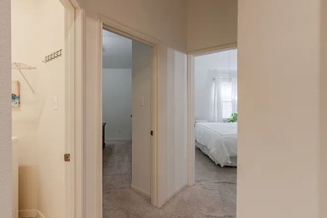 a en suite bathroom with a sink and a mirror