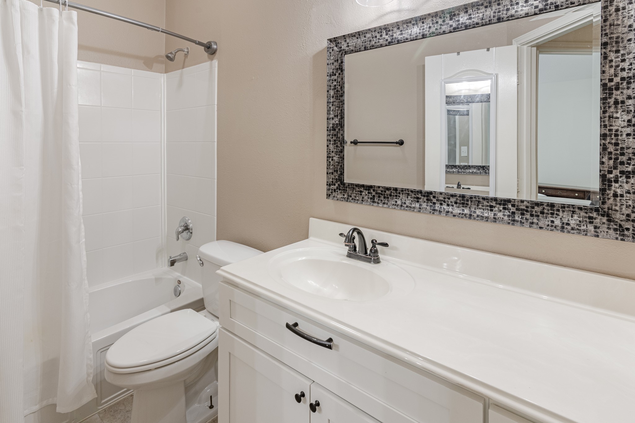 2954 Smokey Forest Lane Spring, TX 77386 - Photo 34 of 40 a bathroom with a sink a toilet and shower