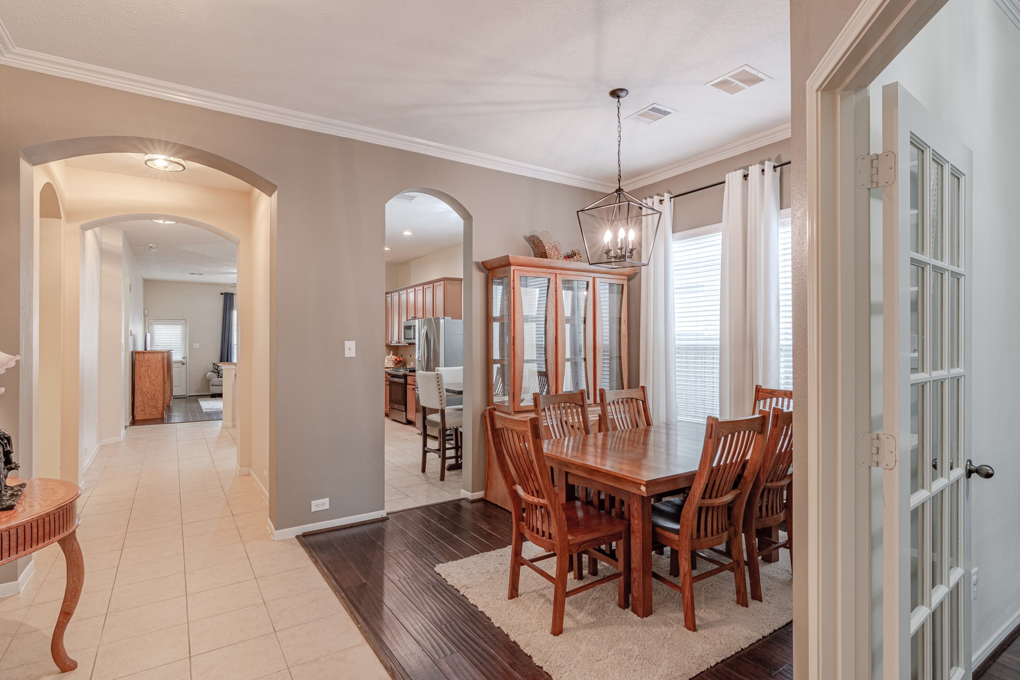 2954 Smokey Forest Lane Spring, TX 77386 - Photo 6 of 40 a view of a dining room with furniture window and wooden floor