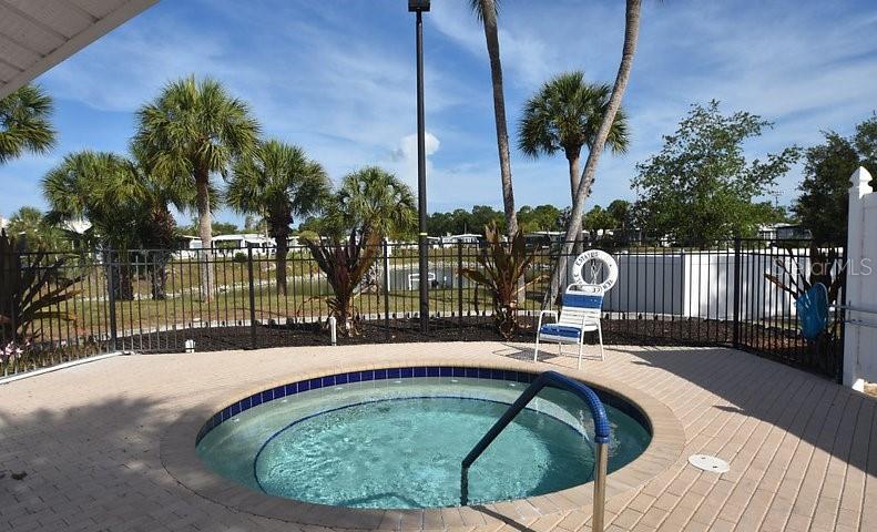 721 Roma Road Venice, FL 34285 - Photo 14 of 20 a view of swimming pool with outdoor seating and plants
