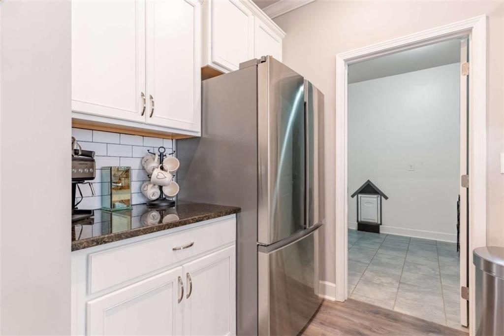 35 Hawthorn Lane Covington, GA 30014 - Photo 12 of 38 a kitchen with stainless steel appliances granite countertop a refrigerator and a sink
