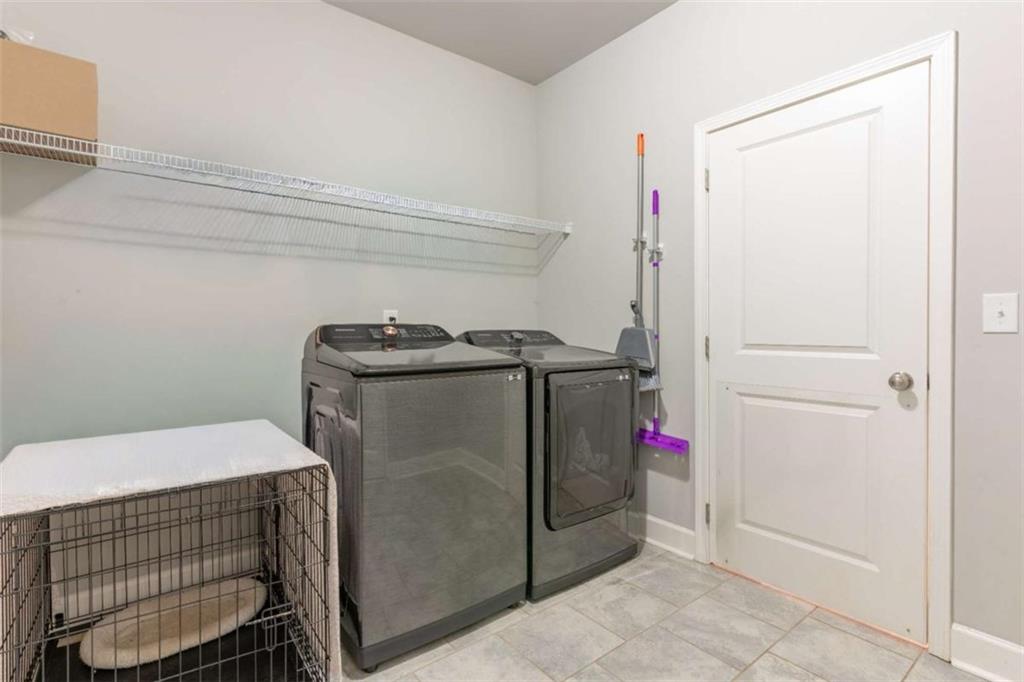 35 Hawthorn Lane Covington, GA 30014 - Photo 24 of 38 a utility room with dryer and washer