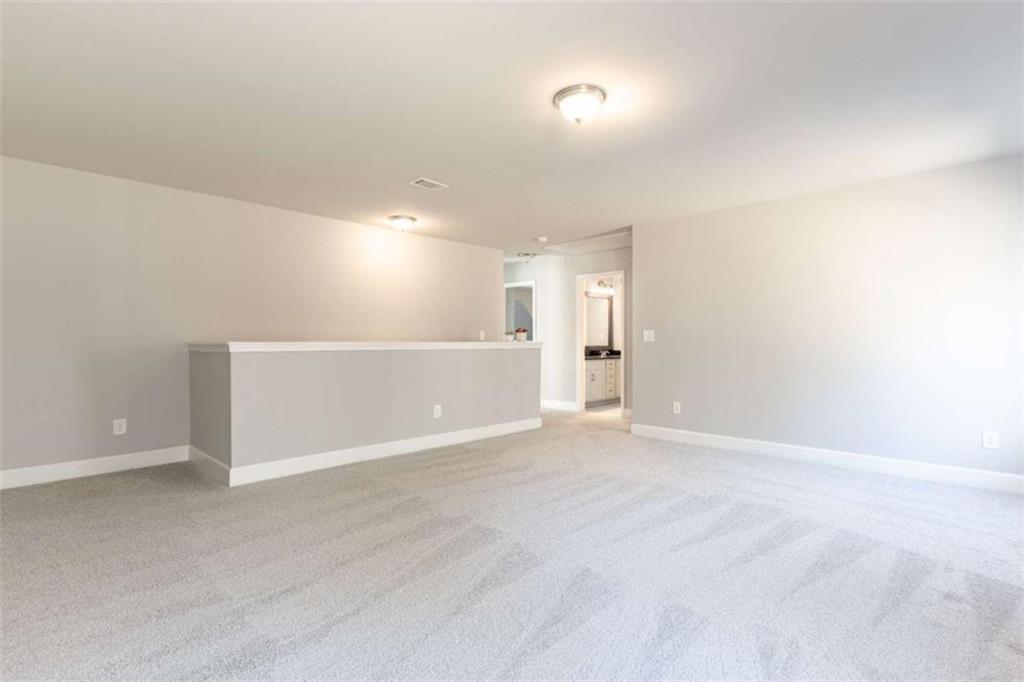35 Hawthorn Lane Covington, GA 30014 - Photo 26 of 38 a view of an empty room