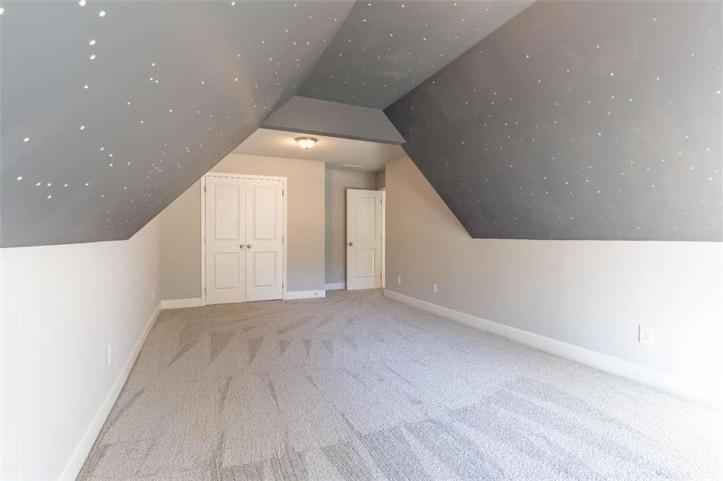35 Hawthorn Lane Covington, GA 30014 - Photo 29 of 38 a view of an empty room with wooden floor