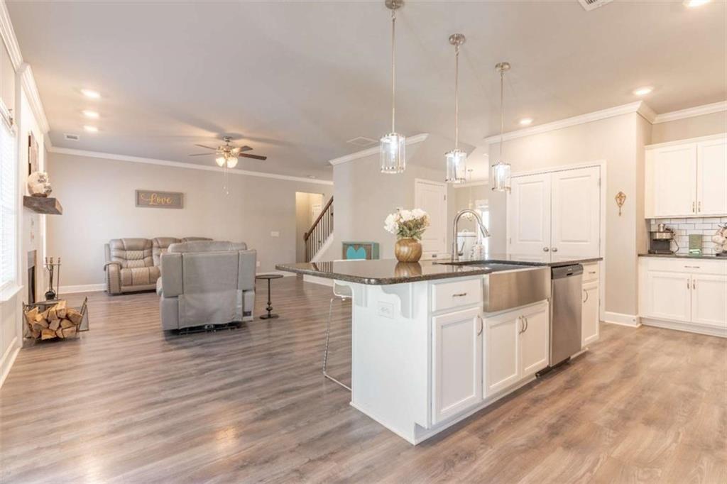35 Hawthorn Lane Covington, GA 30014 - Photo 7 of 38 a large white kitchen with lots of counter space