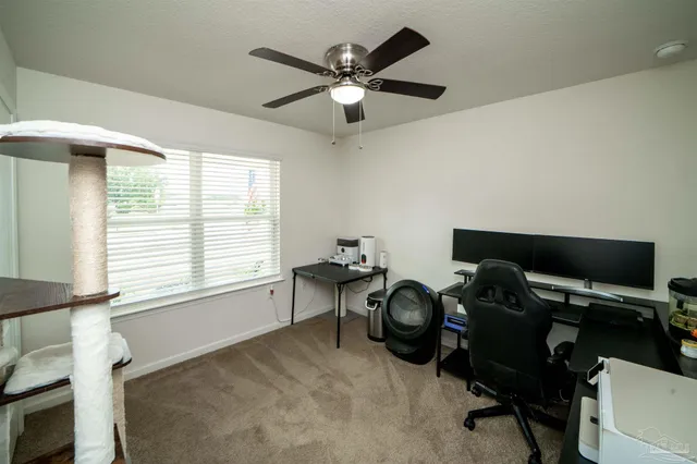 a bedroom with a bed and a cabinets