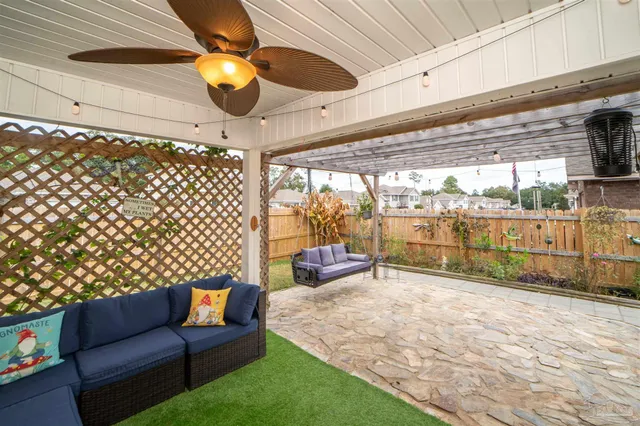 a view of a house with a snow in the yard