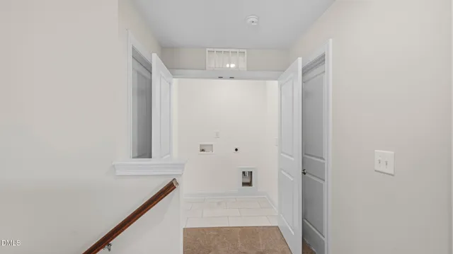 a view of room with window and hardwood