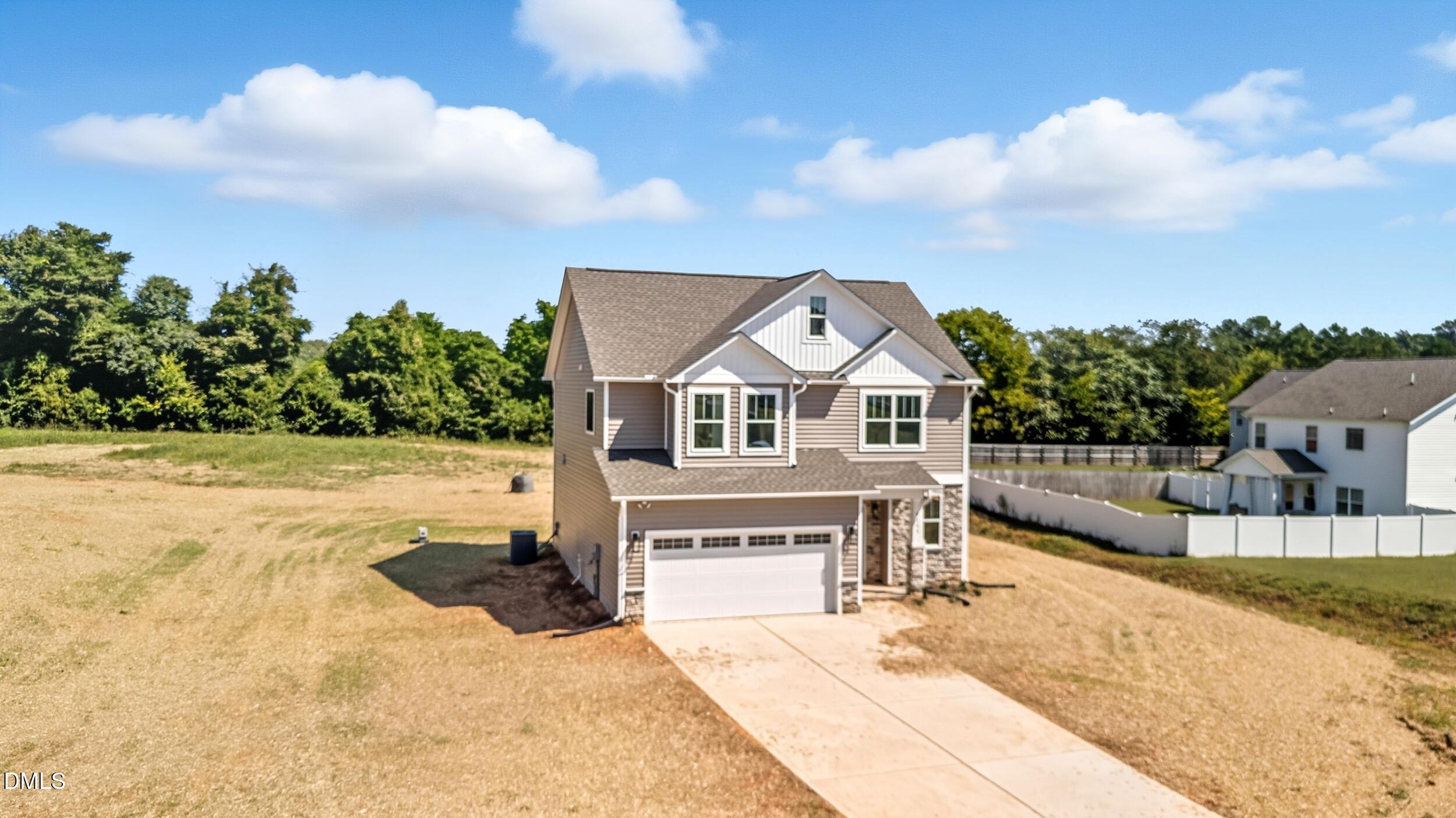 4105 Ralph Holt Court Snow Camp, NC 27349 - Photo 2 of 35 a view of a house with a yard