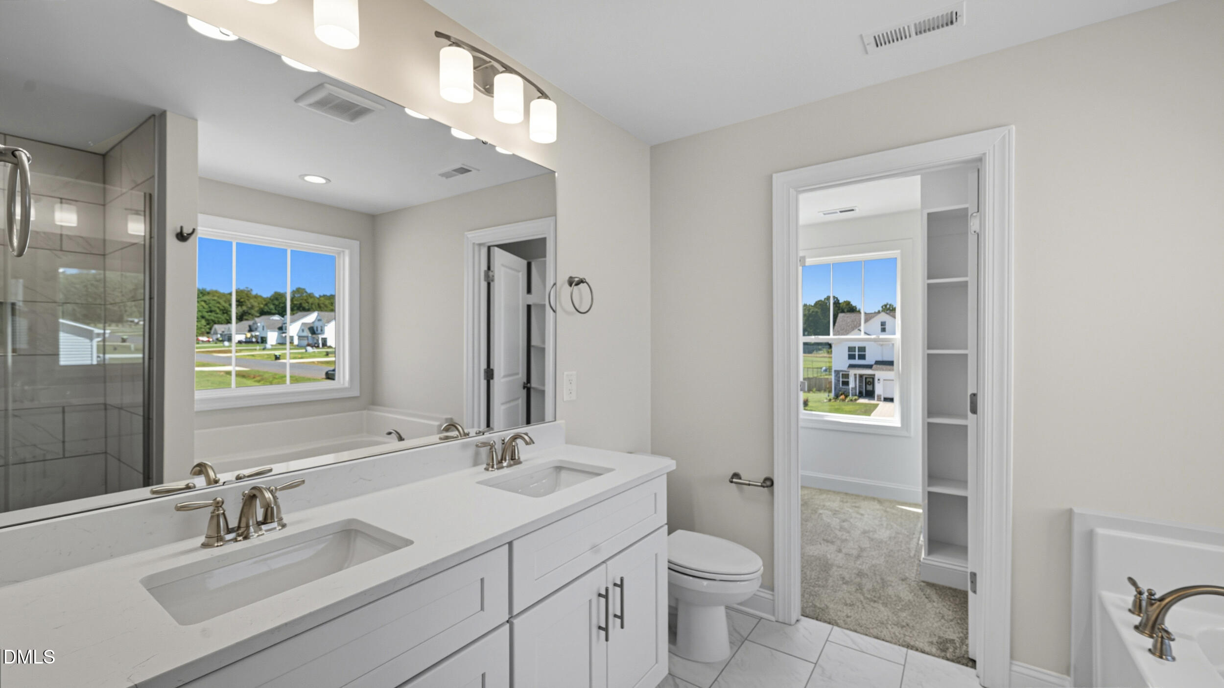 4105 Ralph Holt Court Snow Camp, NC 27349 - Photo 23 of 35 a bathroom with a sink toilet and shower