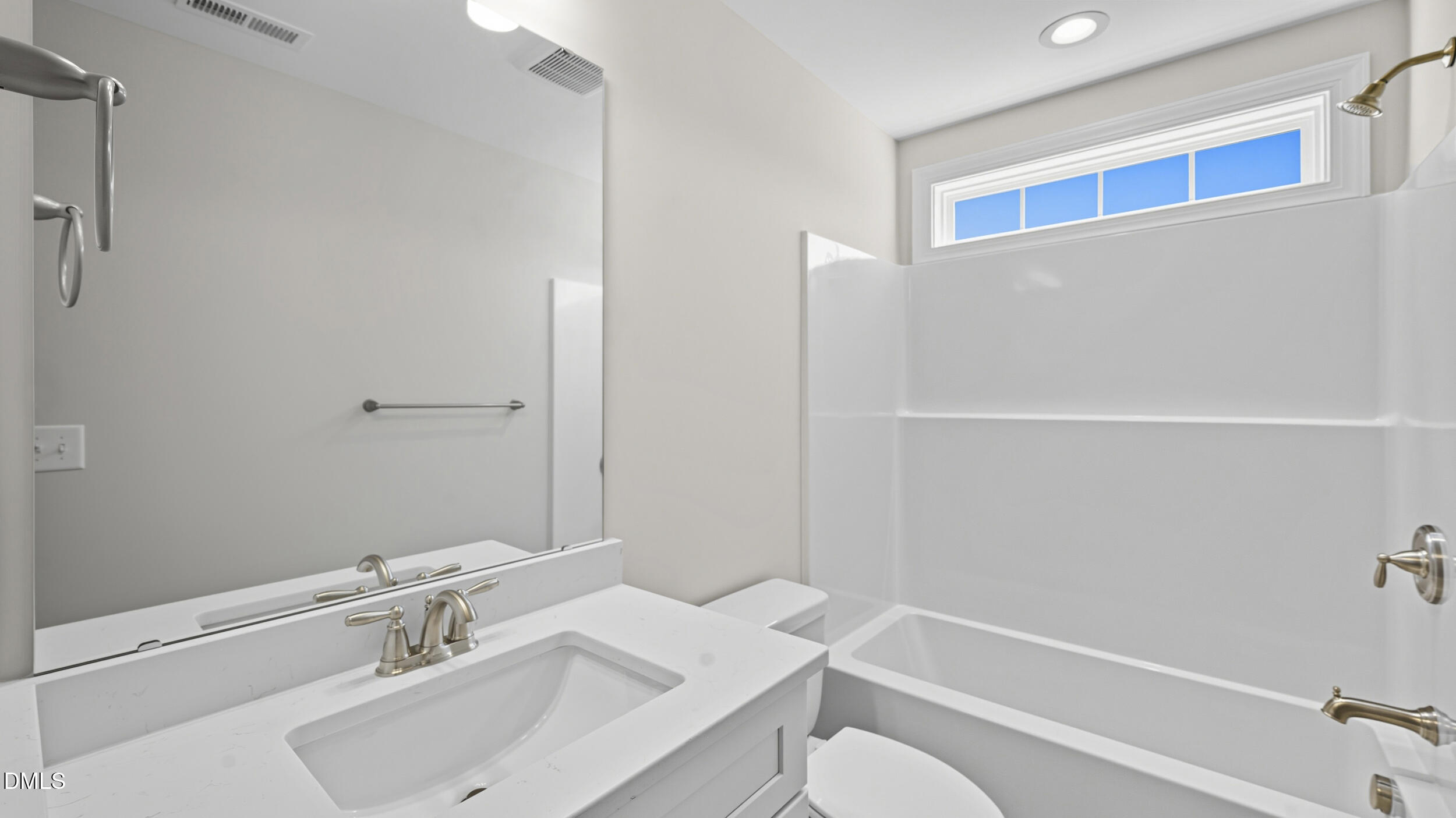 4105 Ralph Holt Court Snow Camp, NC 27349 - Photo 28 of 35 a bathroom with a sink and a mirror