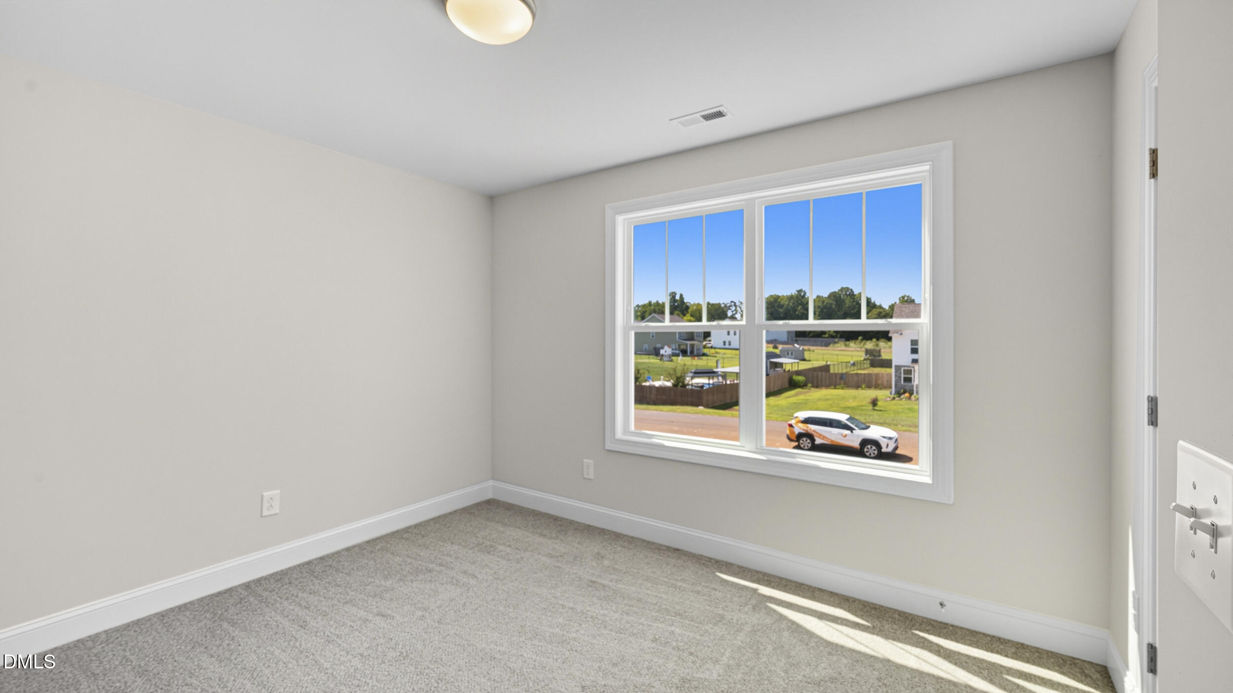 4105 Ralph Holt Court Snow Camp, NC 27349 - Photo 29 of 35 an empty room with window and furniture
