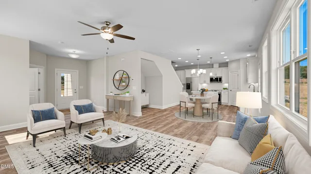 a living room with furniture and a table