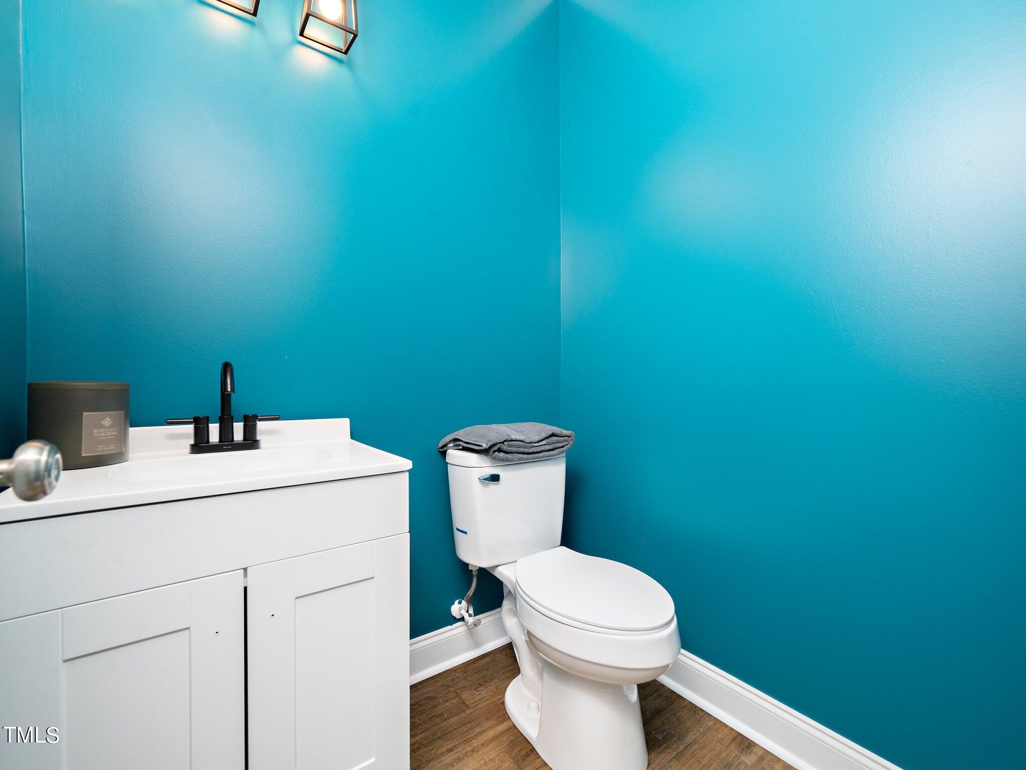 5004 Contender Drive Raleigh, NC 27603 - Photo 28 of 28 a bathroom with a toilet sink