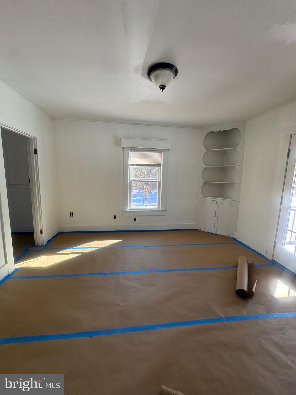 11360 Ridge Road King George, VA 22485 - Photo 13 of 39 an empty room with wooden floor and windows