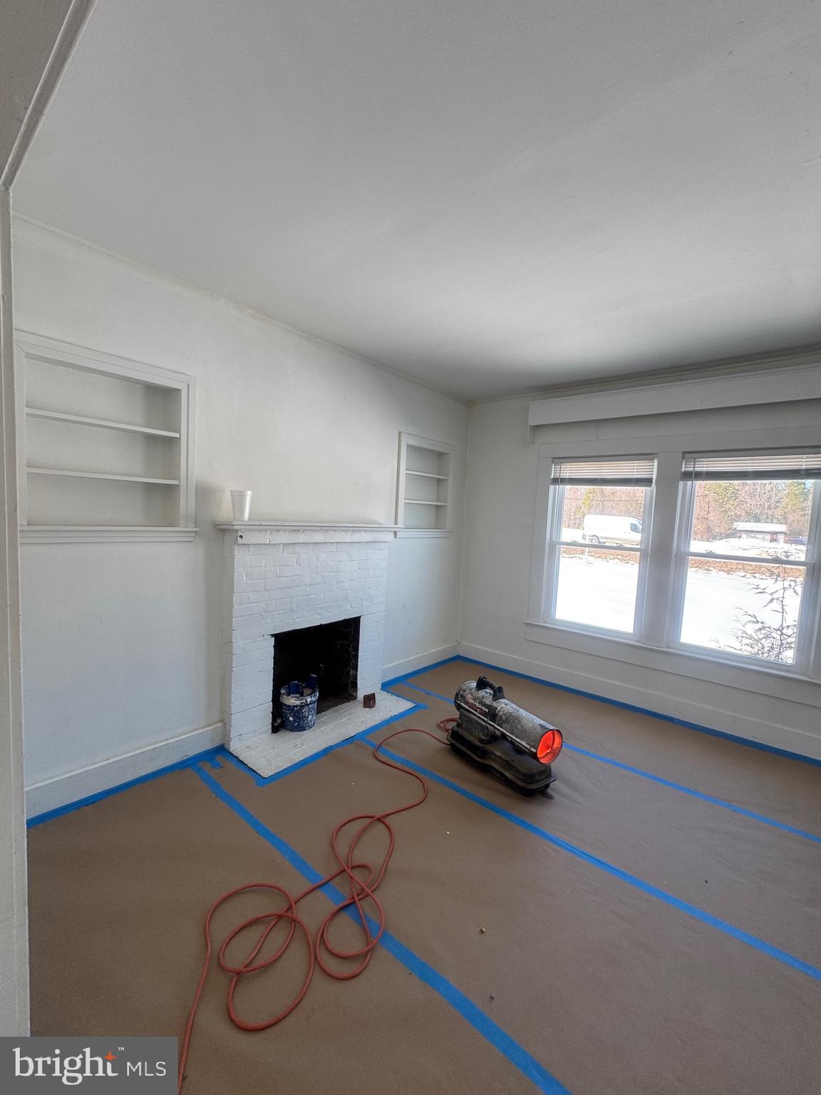 11360 Ridge Road King George, VA 22485 - Photo 14 of 39 a living room with furniture and a fireplace