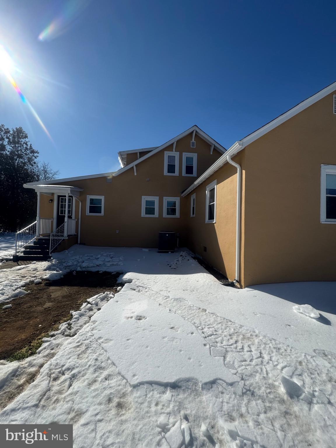 11360 Ridge Road King George, VA 22485 - Photo 19 of 39 a view of house with yard and covered with snow in the background