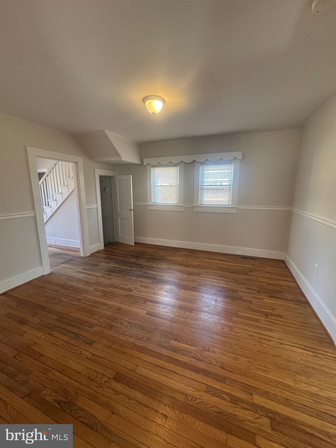 11360 Ridge Road King George, VA 22485 - Photo 27 of 39 an empty room with wooden floor and windows