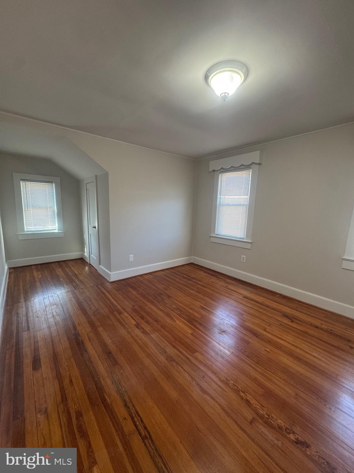 11360 Ridge Road King George, VA 22485 - Photo 35 of 39 an empty room with wooden floor and windows