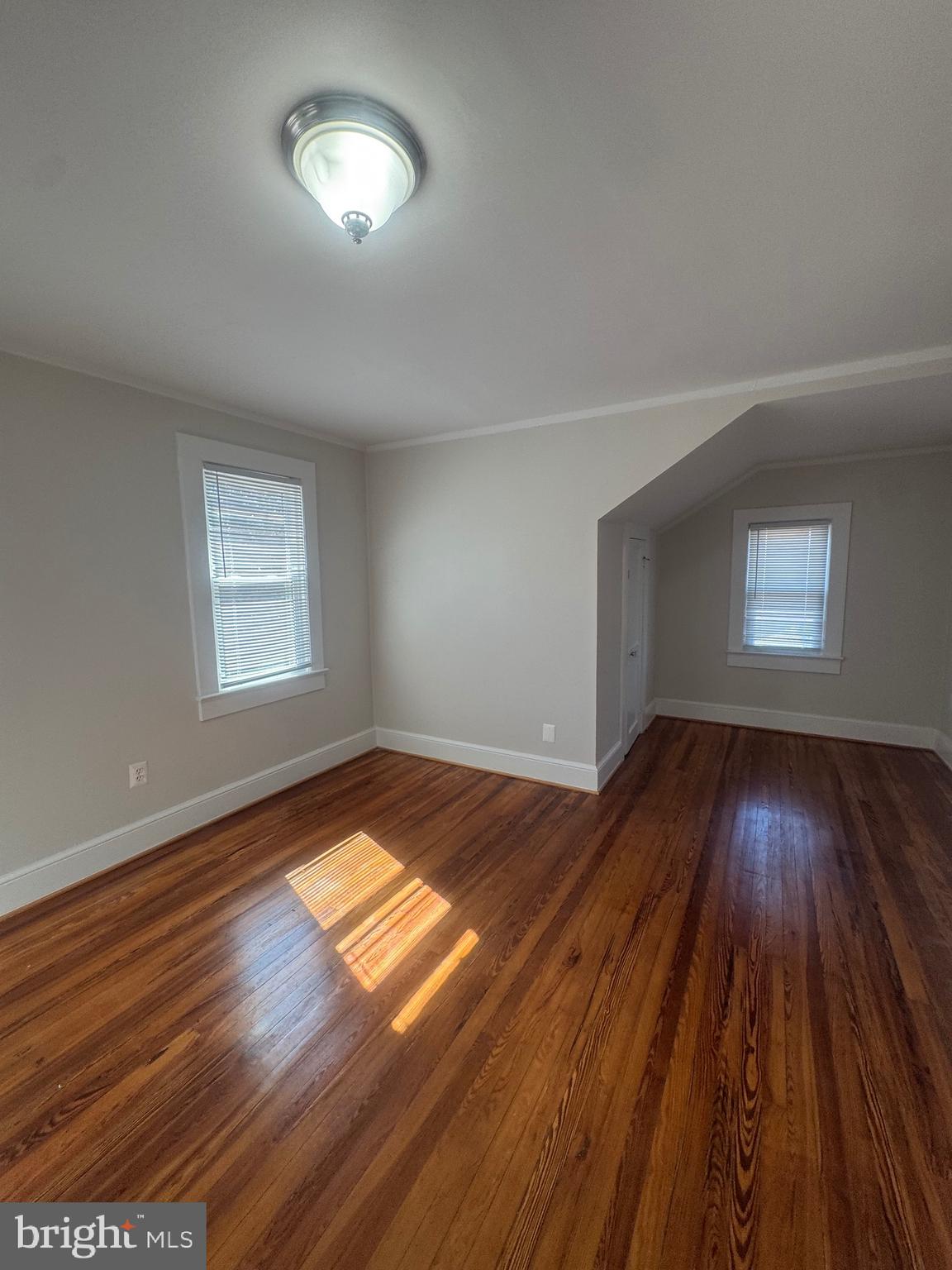 11360 Ridge Road King George, VA 22485 - Photo 36 of 39 wooden floor in an empty room with a window