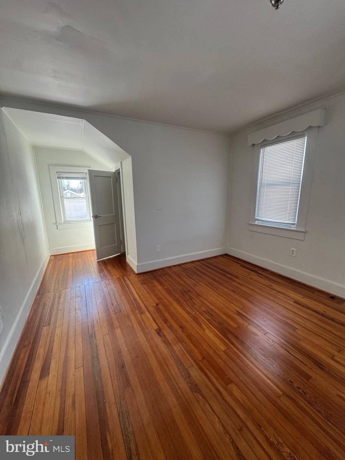 11360 Ridge Road King George, VA 22485 - Photo 7 of 39 wooden floor in an empty room with a window