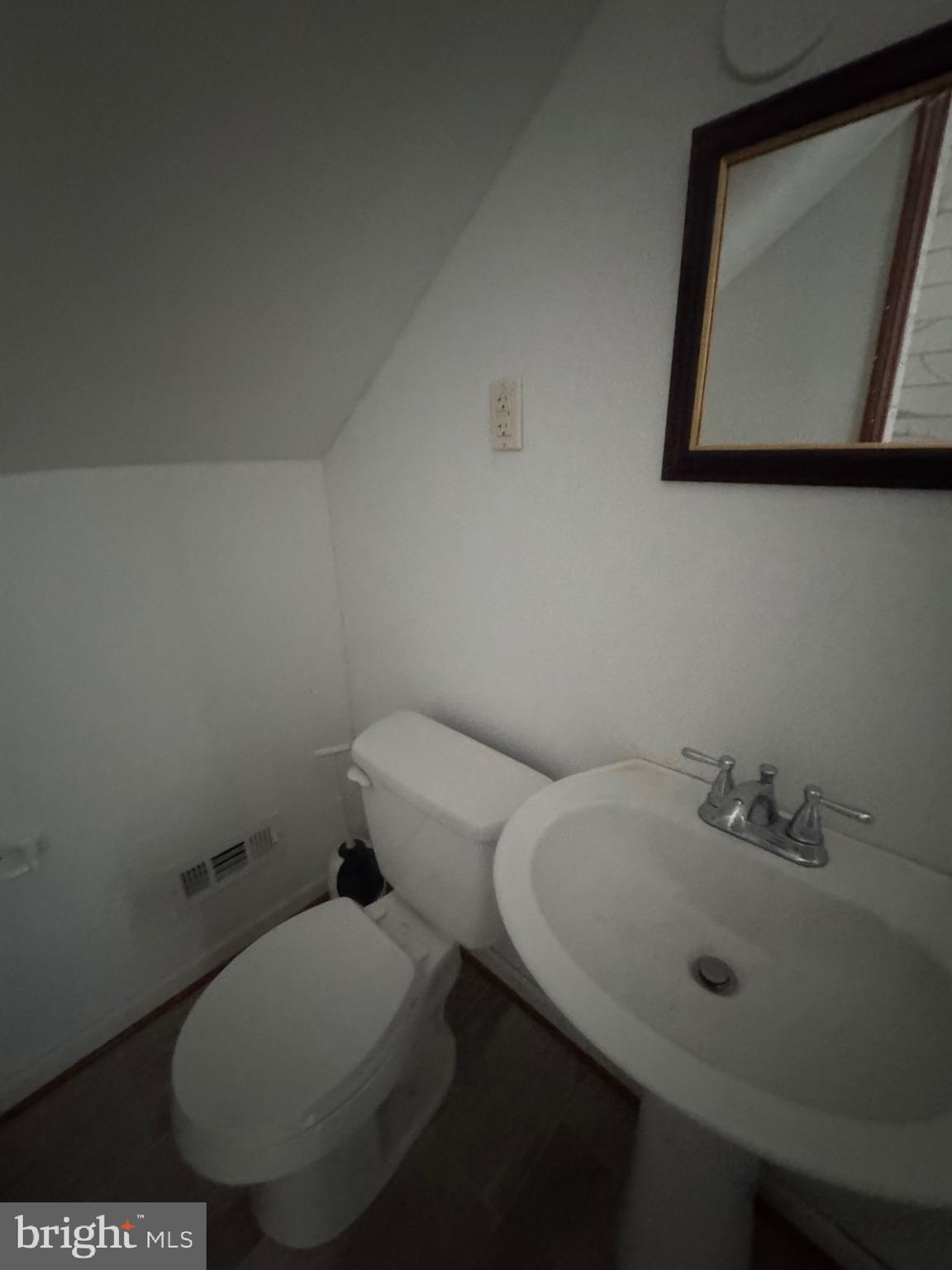 11360 Ridge Road King George, VA 22485 - Photo 8 of 39 a bathroom with a toilet sink and mirror