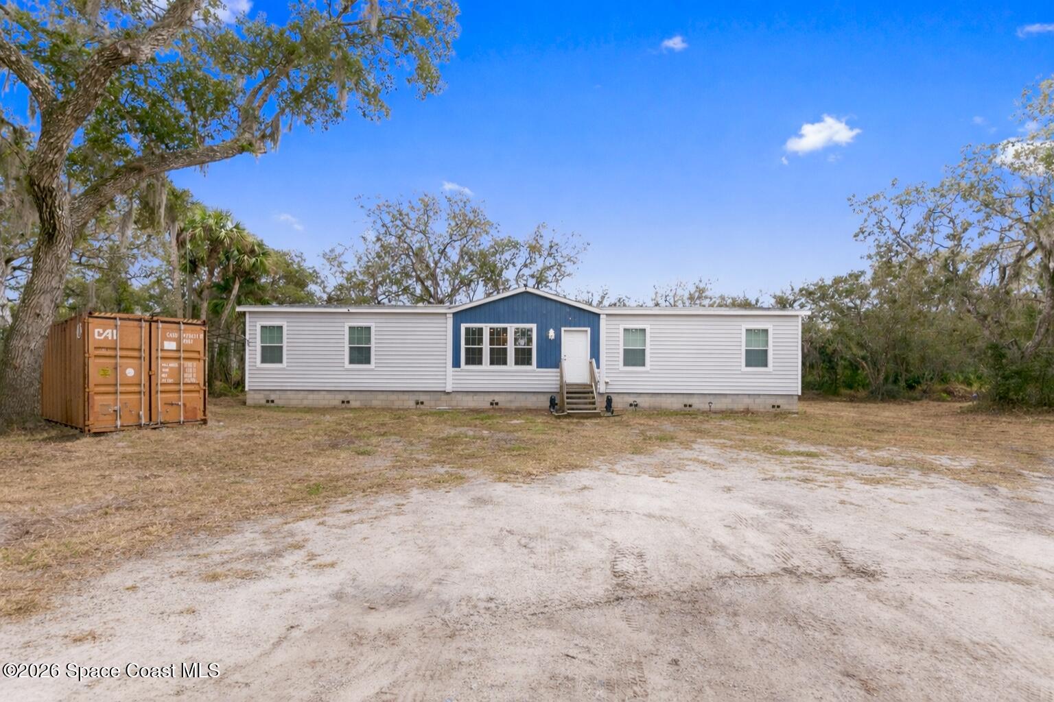 9175 Freedom Road Mims, FL 32754 - Photo 1 of 24 1A99E25E-AA7F-48CD-94C6-E44EF4B6C70A