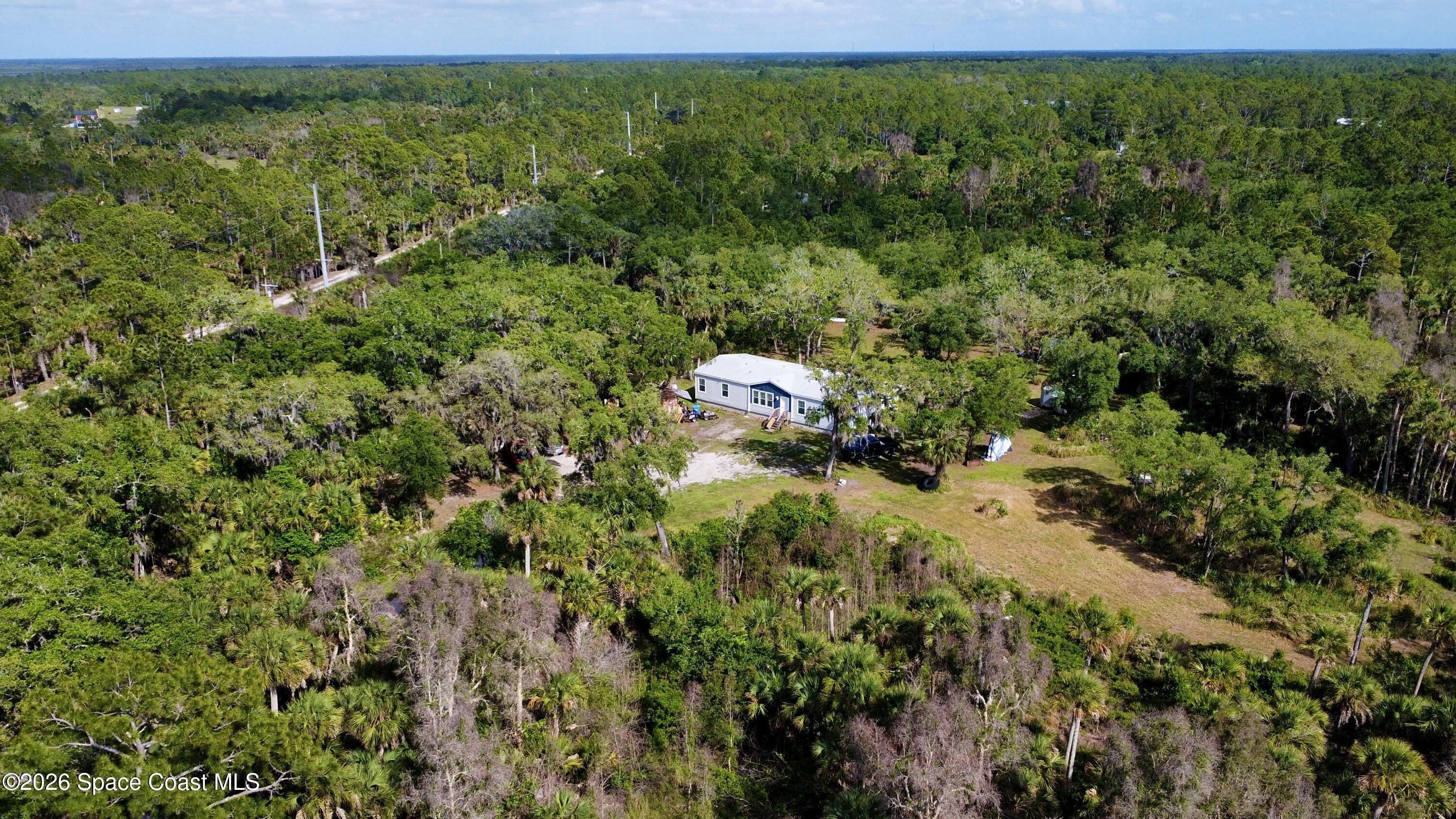 9175 Freedom Road Mims, FL 32754 - Photo 1 of 34 drone1