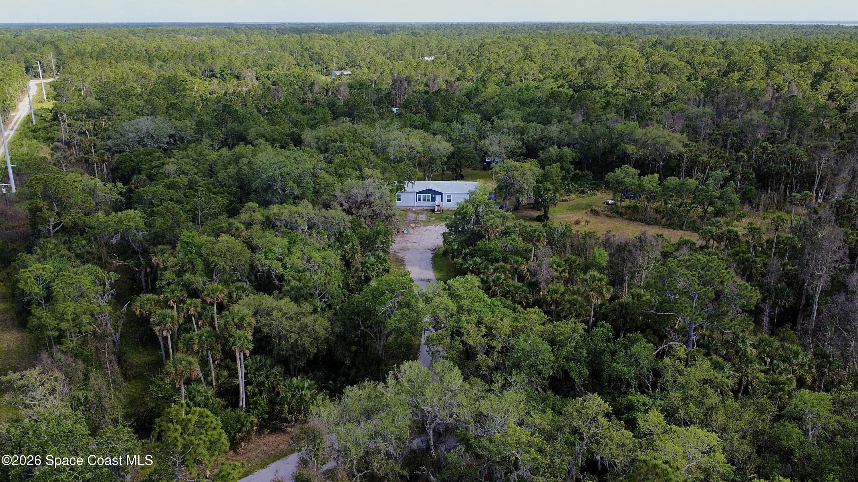9175 Freedom Road Mims, FL 32754 - Photo 32 of 34 drone6