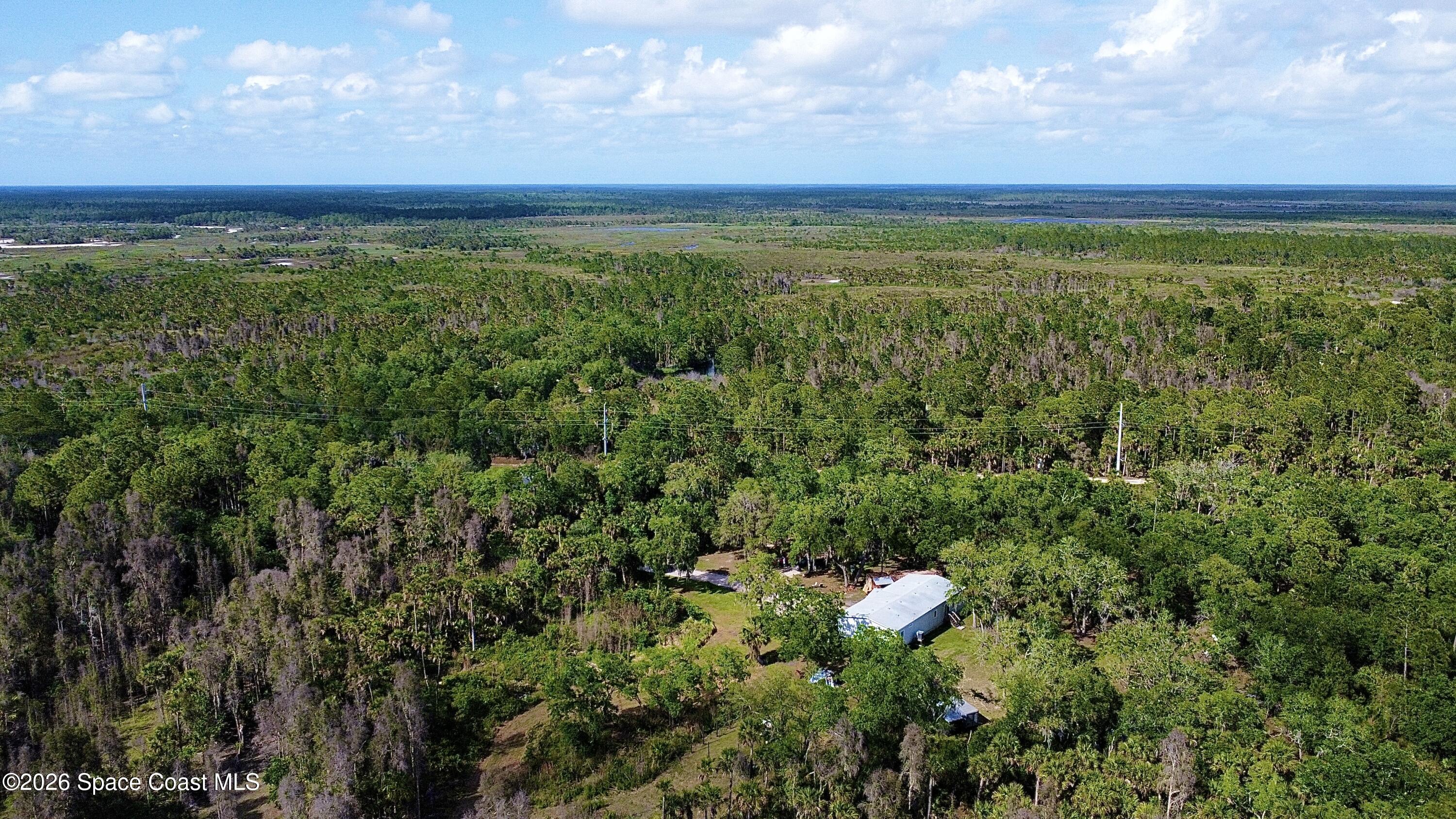 9175 Freedom Road Mims, FL 32754 - Photo 33 of 34 drone5