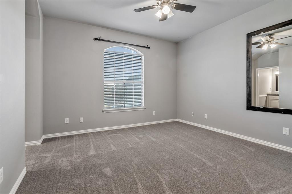 508 Cypress Court Keller, TX 76248 - Photo 31 of 40 an empty room with chandelier fan