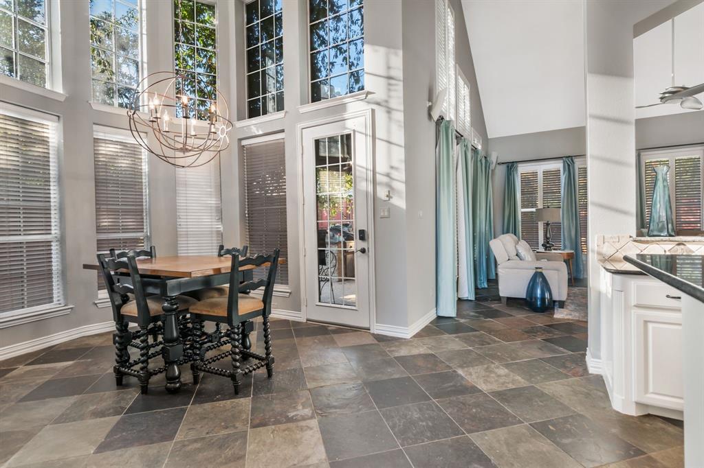 508 Cypress Court Keller, TX 76248 - Photo 9 of 40 a view of a dinning table and chairs in the patio of the house