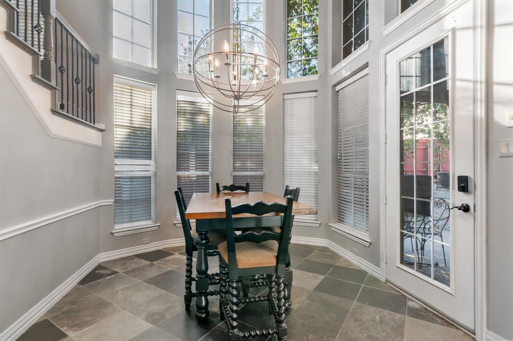 508 Cypress Court Keller, TX 76248 - Photo 10 of 40 a dining room with furniture and chandelier