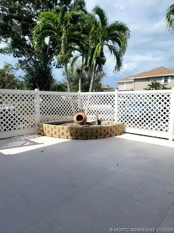 a view of swimming pool with a yard