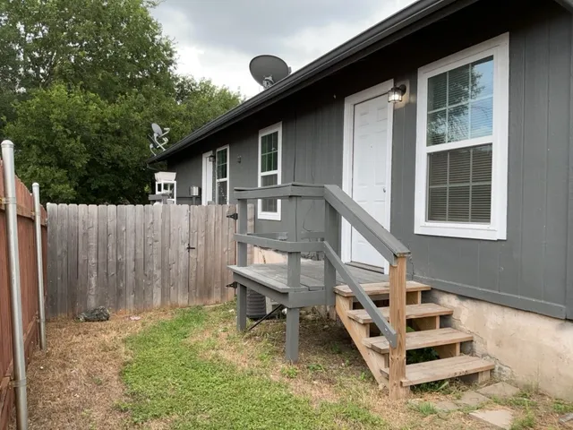 a house view with a garden space